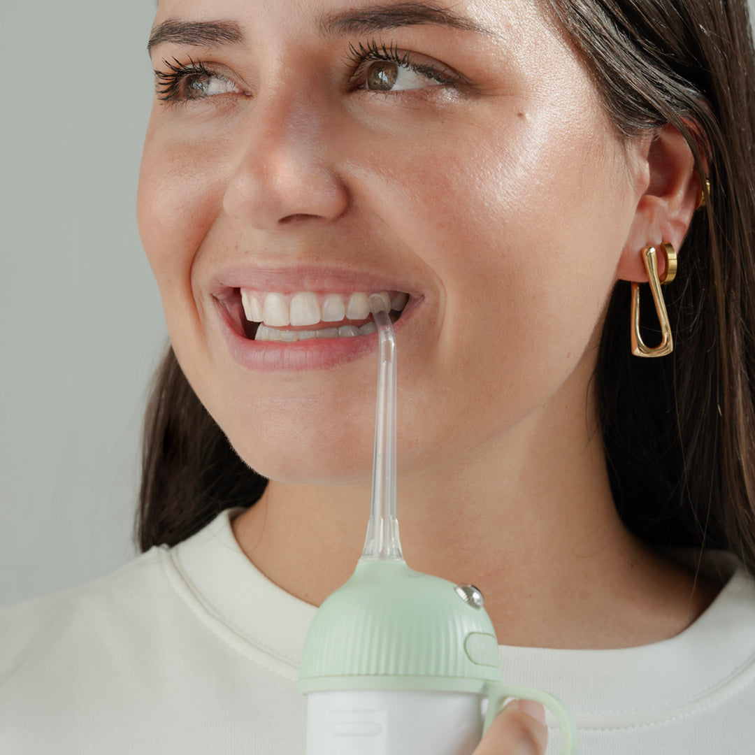 Using water to floss a sparkling smile